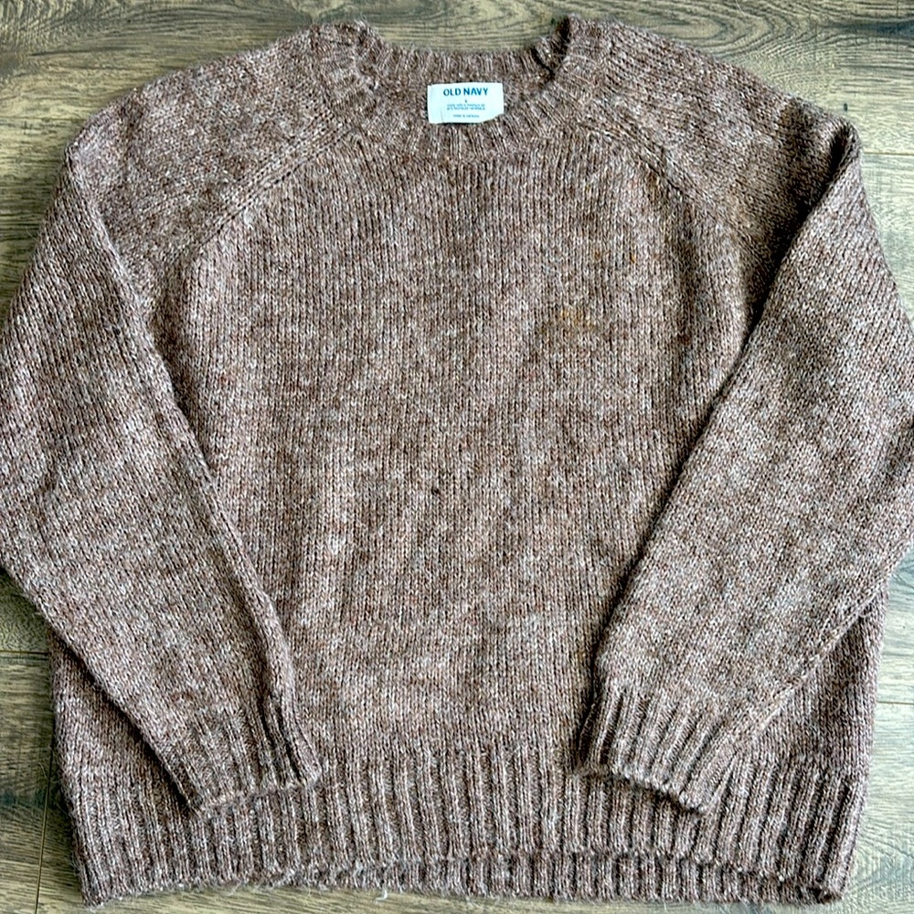 Plum colored women’s sweater